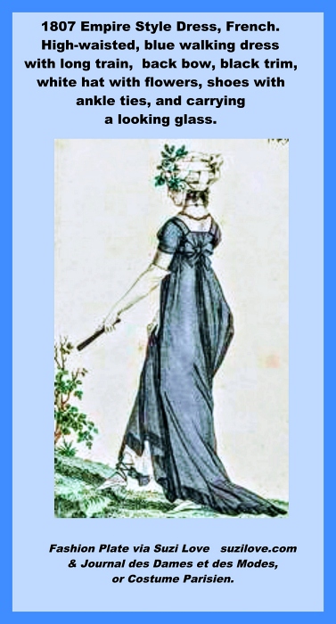 1807 Blue Walking Dress, French. Back bow, a train and black trim, a white hat with flowers and holding a looking glass. Fashion Plate via Journal des Dames et des Modes, or Costume Parisien.